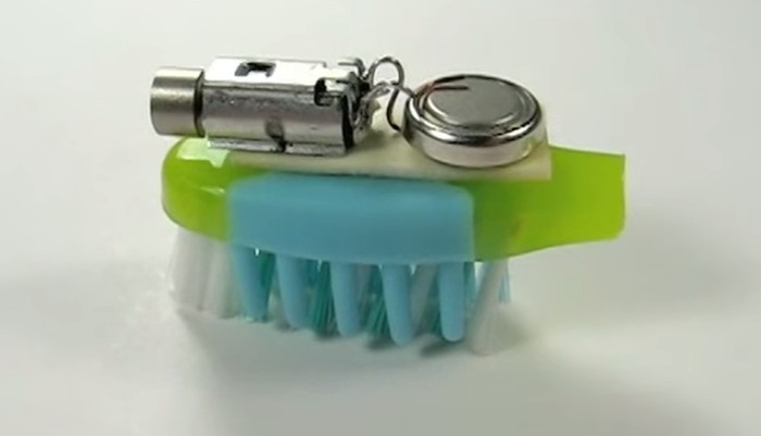 mecanismo sobre cabeca de escova
